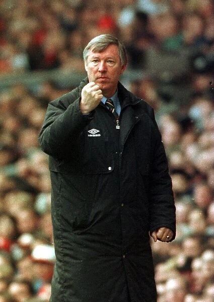 Alex Ferguson Manchester United Football Manager clenches his fist as he celebrates after