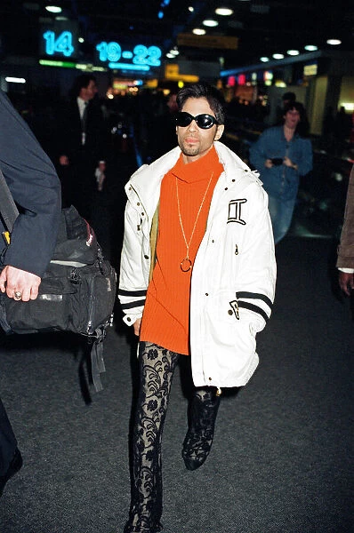 American pop star, the artist formerly known as Prince, leaving Heathrow Airport for New