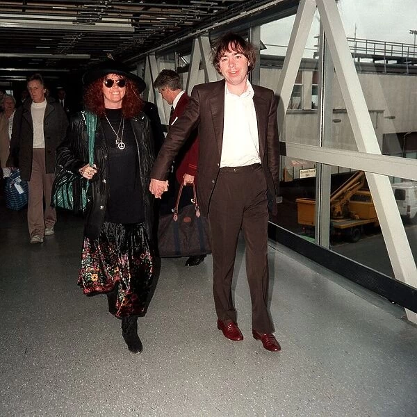 Andrew Lloyd Webber composer songwriter with his wife Sarah Brightman singer at Heathrow