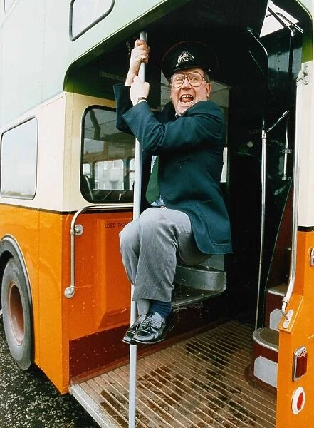 Andy Cameron having fun on a double decker bus March 1993