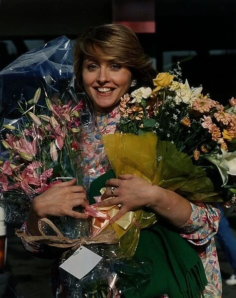 Anne Diamond TV Presenter Holding flowers