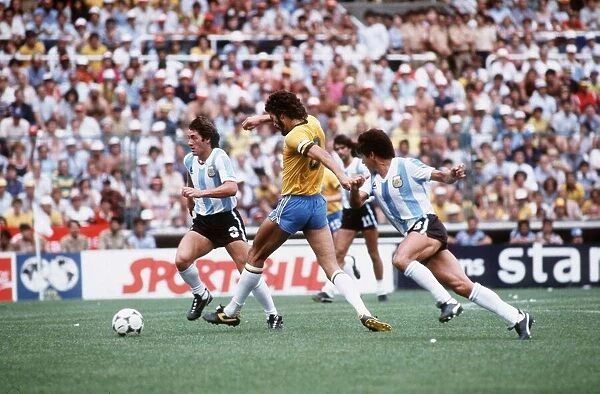 Argentina v Brazil 1982 World cup match Socrates tries to get a foot in