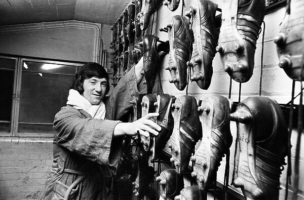 Arsenal footballer George Armstrong pictured in the boot room at Highbury football ground