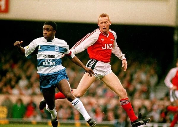 Arsenal footballer Perry Groves and QPRs Paul Parker in an FA Cup match in January