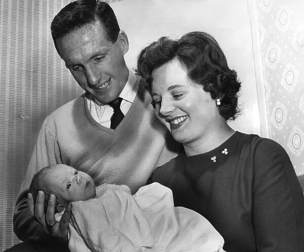 Aston Villa footballer Vic Crowe, his wife Barbara and their month old son, Mark
