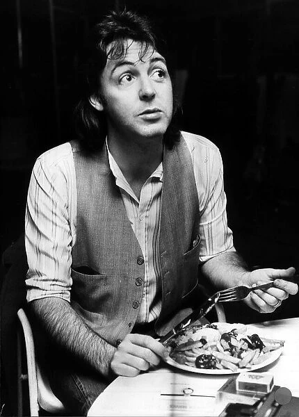 Former Beatles singer Paul McCartney, eating fish and chips . November 1977