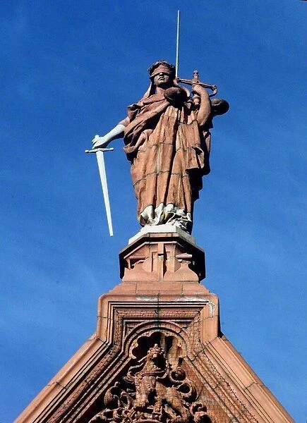 Blindfolded figure of justice on Victoria Law courts