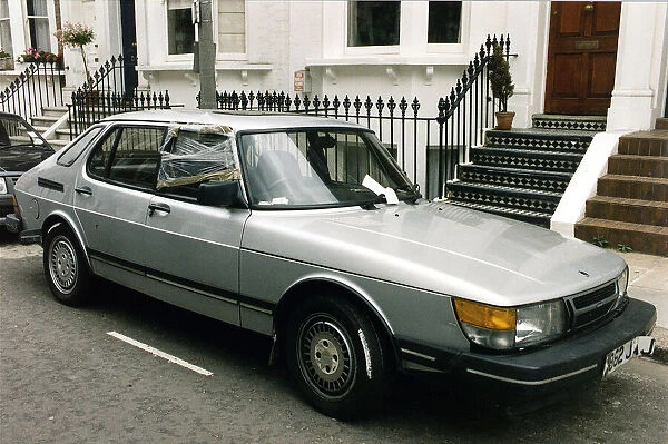 Bob Geldof silver Saab 900 car owned by Bob with broken drivers window covered with
