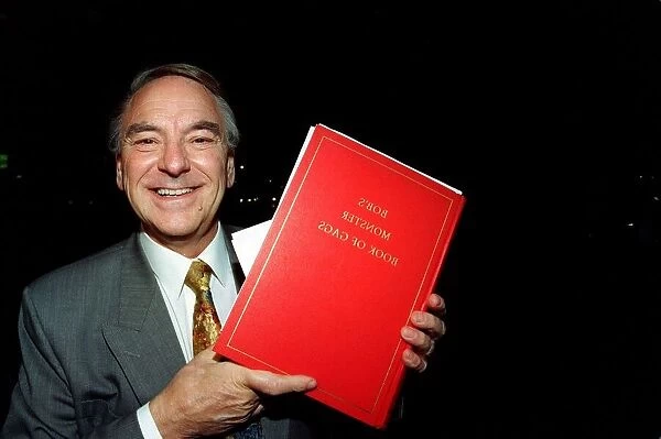 Bob Monkhouse Comedian  /  TV Presenter holding the book of gags that was stolen from his