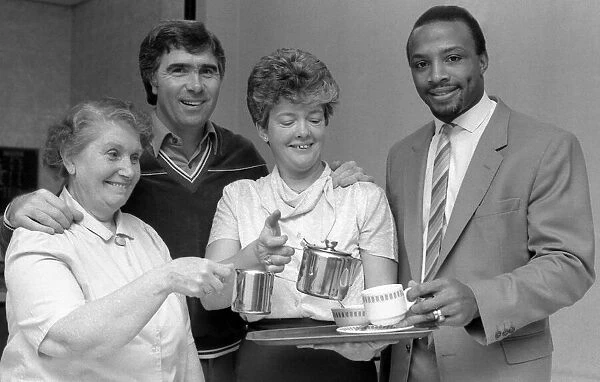Bobby Gould welcomes new signing Cyrille Regis to Coventry City with a cup of tea