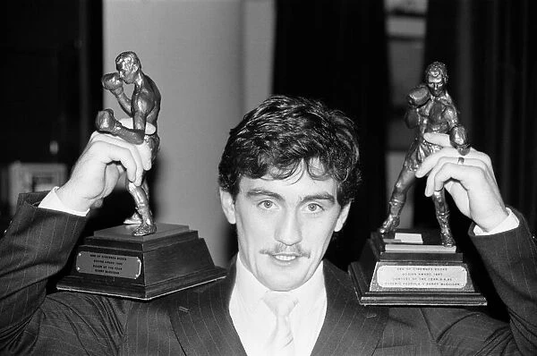 Boxer Barry McGuigan with his awards for Boxer and fight of the year