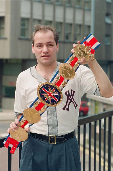 Boxer Kostas Petrou with his championship belt. 23rd September 1994