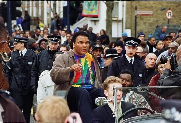 Boxing legend Muhammad Ali (Cassius Clay) February 1999 rides through Brixton