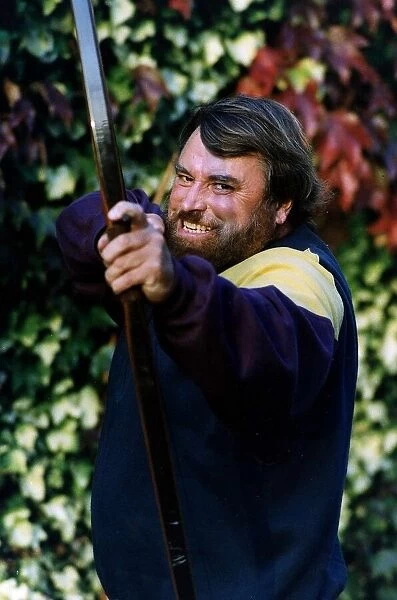 Brian Blessed Actor pulls an 80lb crossbow