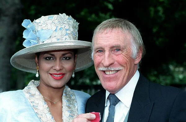 Bruce Forsyth Comedian  /  TV Presenter, July 98. With his wife Wilnelia after