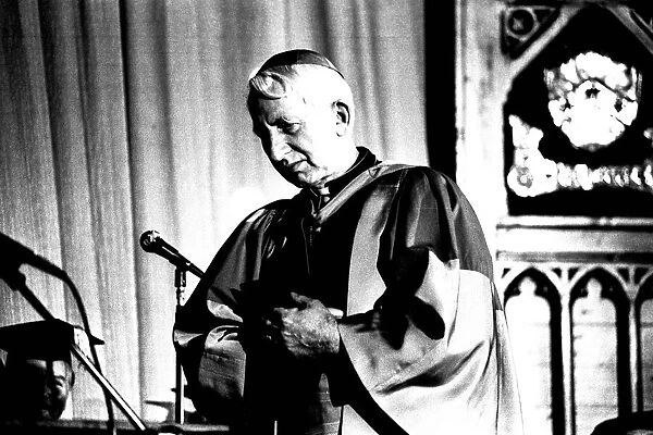 Cardinal Basil Hume Archbishop of Westminster, was receiving an Honorary Doctor of