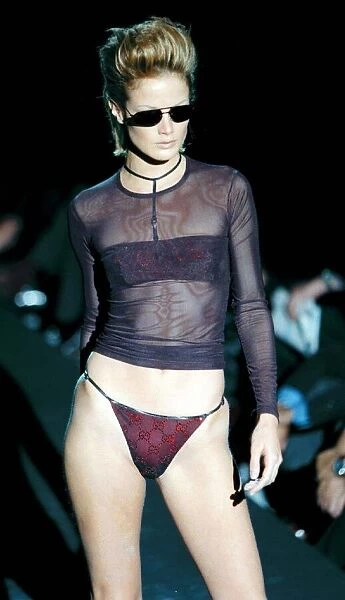 Carolyn Murphy Gucci swimwear Milan Fashion Show 1997 Wearing a red string bikini