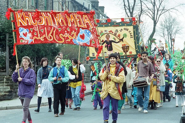 Carrying the banner Khushi Ka Mela, a festival of Asian arts