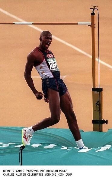 Charles Austin USA celebrates after winning gold in the high jump in the Atlanta Olympic