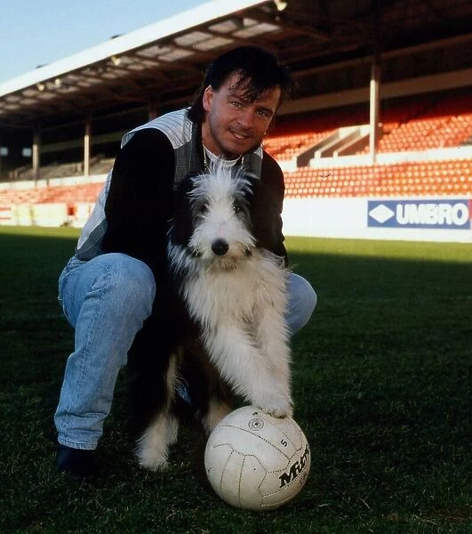 Charlie Nicholas with his dog November 1988