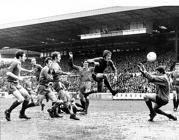 Chelseas Ian Hutchinson gives Ray Clemence a tough shot to save in a game that