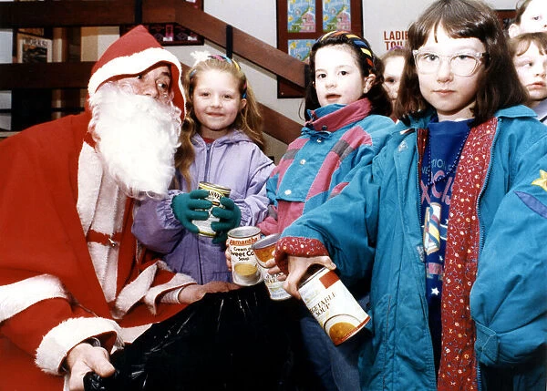 Children turned the tables on Santa at the Billingham Forum - taking gifts to him