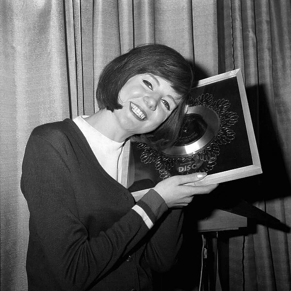 Cilla Black singer with her silver disc March 1964 for her record Anyone who