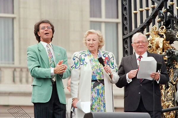 Cliff Richard, Dame Vera Lynn and Harry Secombe, singing for the crowds gathered at