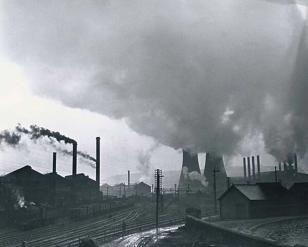 Cooling towers and smoking chimneys pollute the air at a Sheffield industrial site