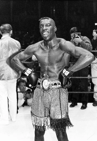 Delroy Bryan Boxing stands in the centre of the ring posing with his hands on his hips