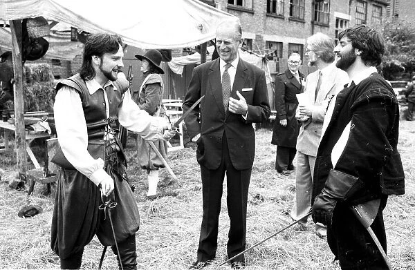 The Duke of Edinburgh visits a film set, chatting to an actors - 17  /  7  /  1987