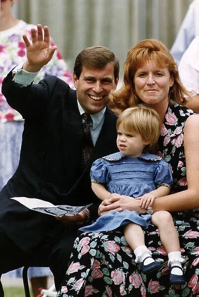 Duke Of York with his wife The Duchess of York waving to his baby daughter