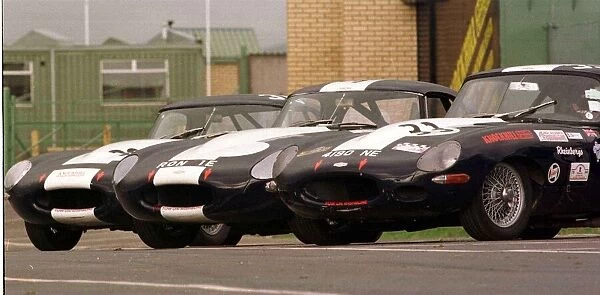 E-TYPE JAGUAR FEATURE AUGUST 1997 E TYPES LINED UP TO RACE