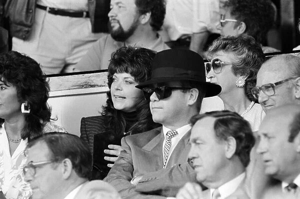 Elton John and his wife Renate watching his team, Watford, play Tottenham Hotspur