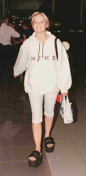 Emma of Spice girls leaves Heathrow for Paris 1997