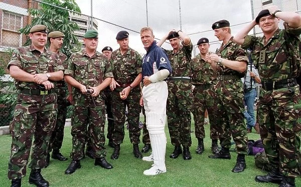 England cricket captain Alec Stewart Nov 1998 with a group of British soldiers at