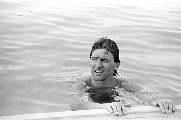 England footballer Bryan Robson relaxing in the swimming pool at the Cima Club in