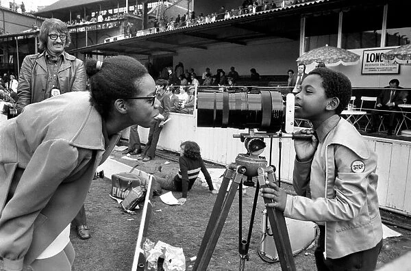 England v. West Indies at Oval. Sisterly love as two West Indian fans take a look down