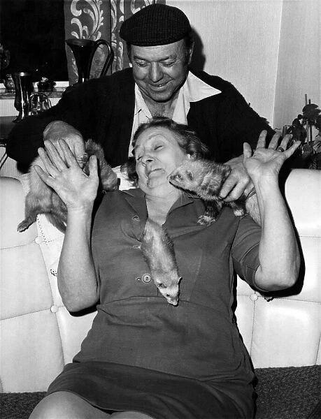 Eric and Queenie, bitten by the ferret-tickling bug. May 1975 P011792