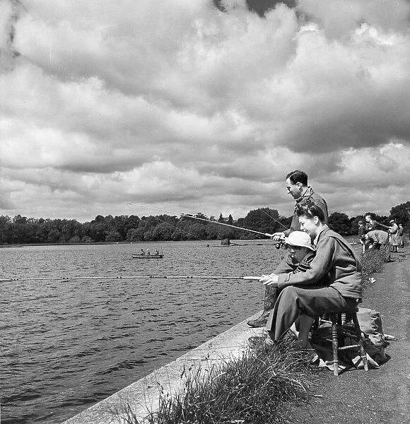 Family fishing at the reservoir near Aldenham Hertfordshire