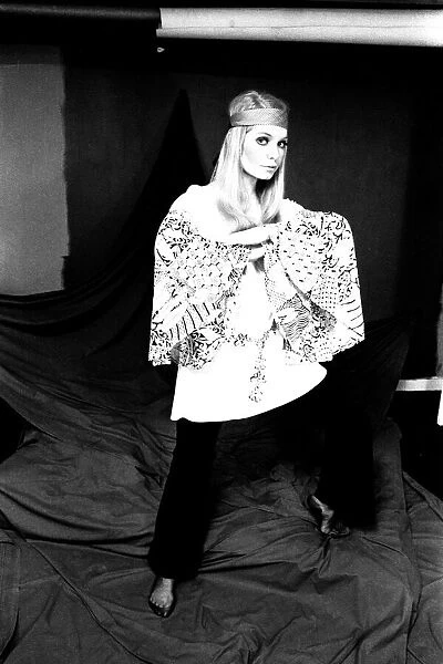 A fashion shoot from 13 April 1970 - A model wears a kaftan and trousers