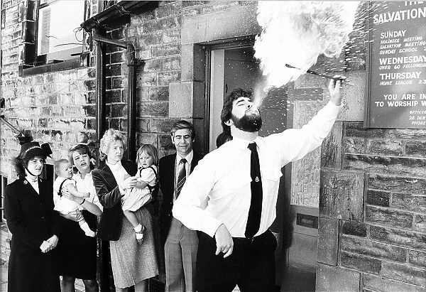 Fire-eater Salvation Army Lt Iain Martin June 1985 demonstrates his talents as a