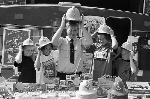 Fireman Paddy Flaherty made sure these youngsters had the right hat of the occasion when