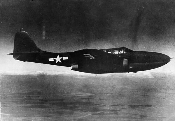 The first US jet propelled plane, the P-59 Airacomet is shown in a test flight