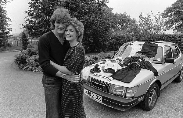 Footballer Glenn Hoddle with wife Ann and new car 1982 a Saab 900 turbo amongst