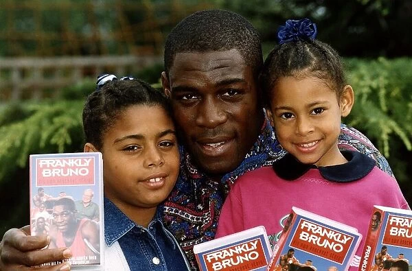 Frank Bruno Boxer with his daughters Nicola 11 and Rachel 7 promoting the new video of