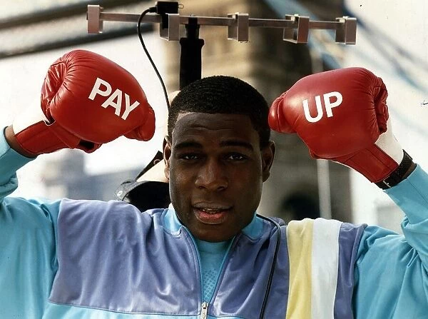 Frank Bruno Boxing Standing under tv aerial wearing boxing gloves