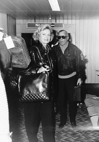 Frank Sinatra and wife arriving at LA airport