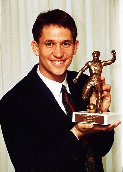 Gary Lineker shows off his player of the year trophy May 1992