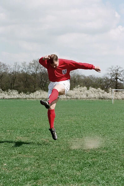 Geoff Hurst plays a game of football with the original World Cup ball after it was